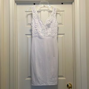Beautiful white knee level dress.